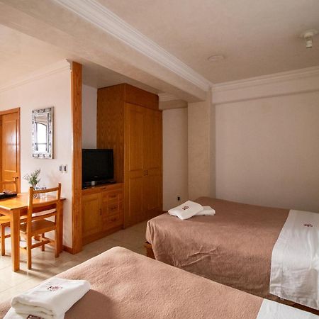 Suites Sevilla Пуебла Екстер'єр фото